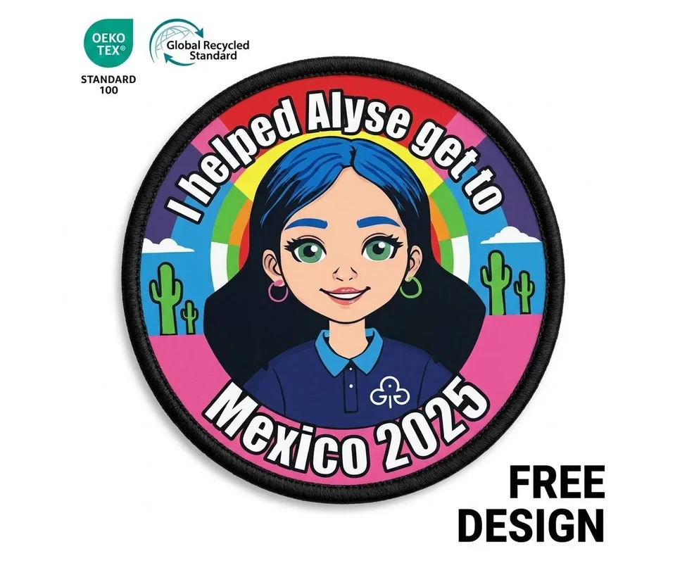 Custom heat transfer patch with full-colour cartoon artwork and merrowed border