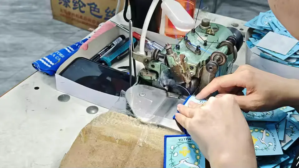 Operator performing edge sewing and trim finishing