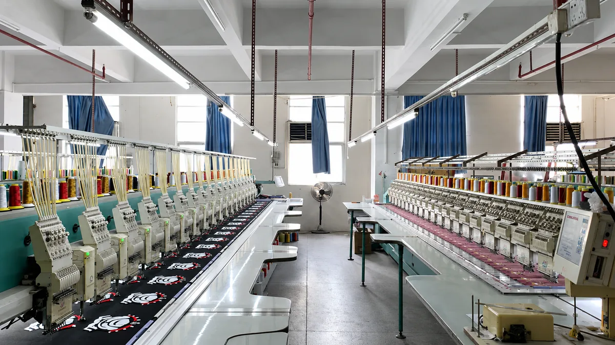 Multi-head embroidery machines producing patch artwork