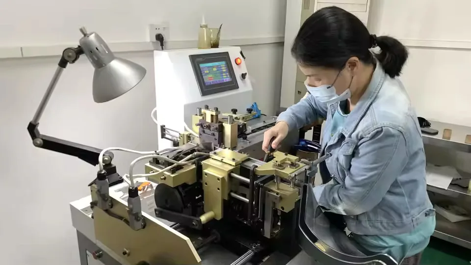 SAIM Label operator working at a label finishing station