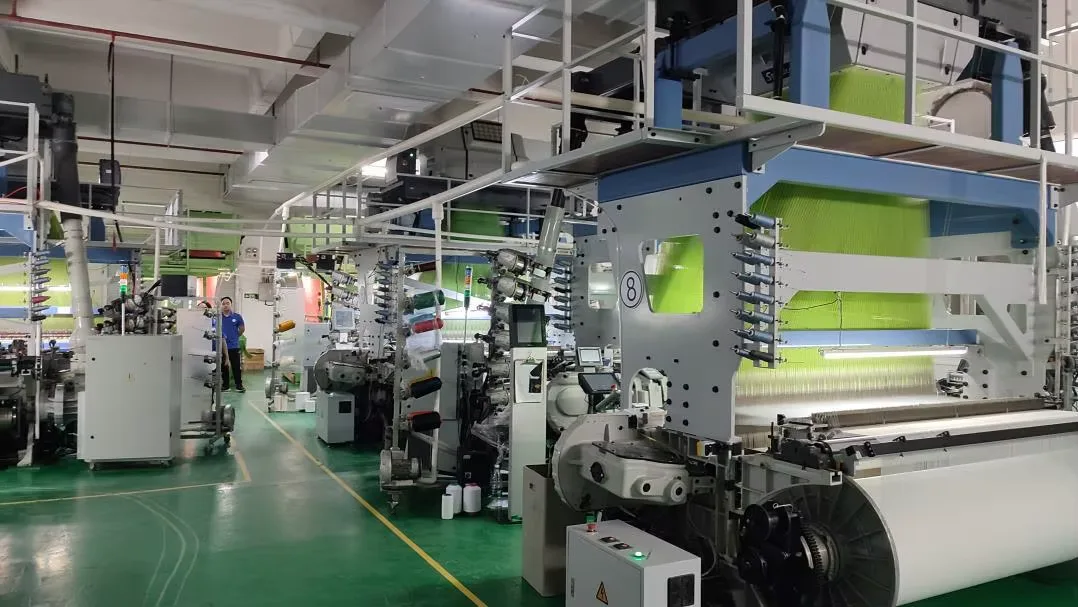 Industrial weaving machine in the SAIM Label production workshop