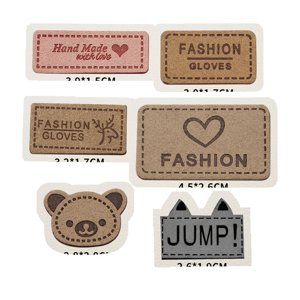 Assorted small PU leather labels with stitch borders and custom shapes