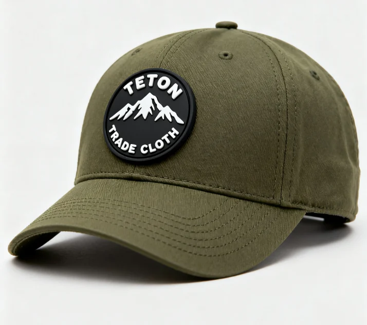 Custom PVC patch applied to a cap with hook and loop backing