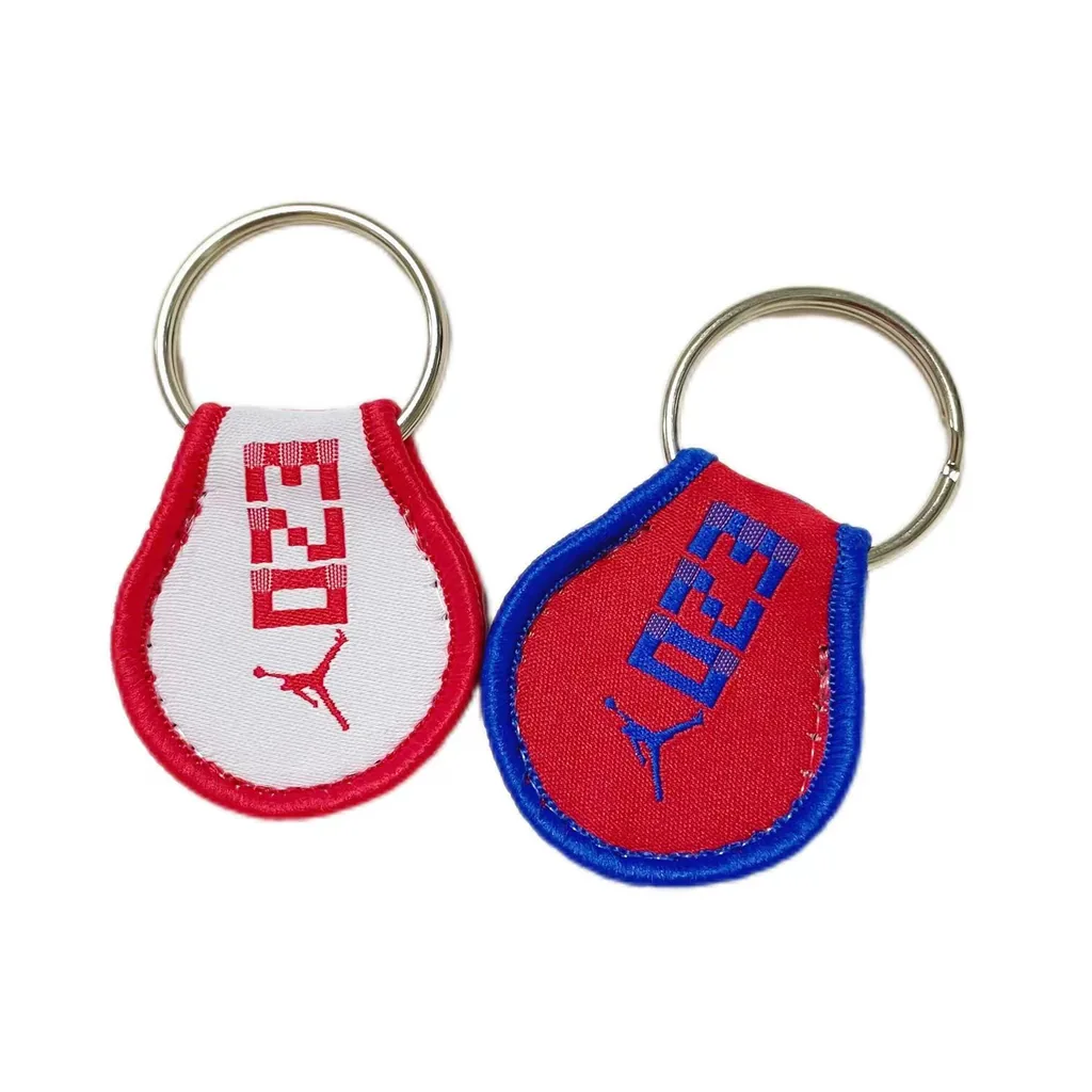 Woven jet tag keychain with metal keyring