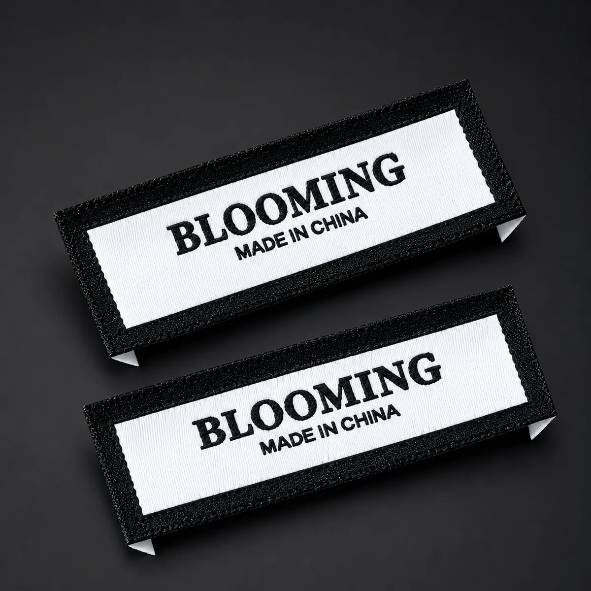 Woven Blooming Made in China damask labels, black border on white