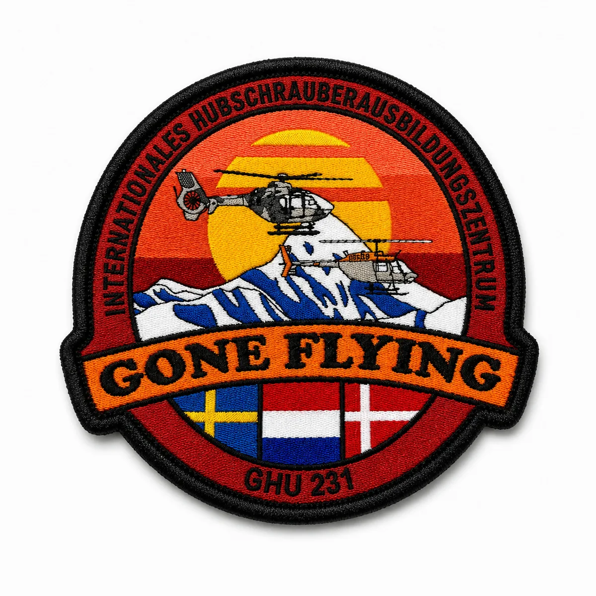 Round woven aviation patch with a helicopter and country flags