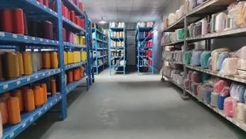 Yarn warehouse with color-sorted polyester spools